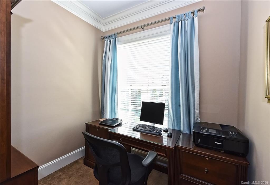 2823 Providence Road, Unit 228 Charlotte, NC 28211 - Photo 19 of 24 a view of a workspace with furniture
