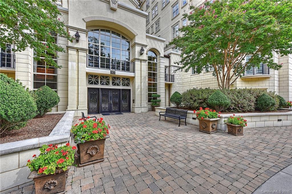 2823 Providence Road, Unit 228 Charlotte, NC 28211 - Photo 3 of 24 a front view of a house with outdoor seating
