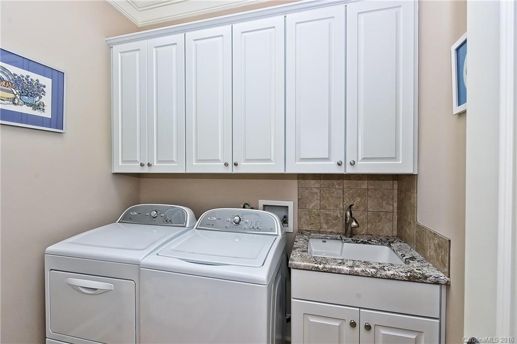 2823 Providence Road, Unit 228 Charlotte, NC 28211 - Photo 21 of 24 a utility room with dryer and washer
