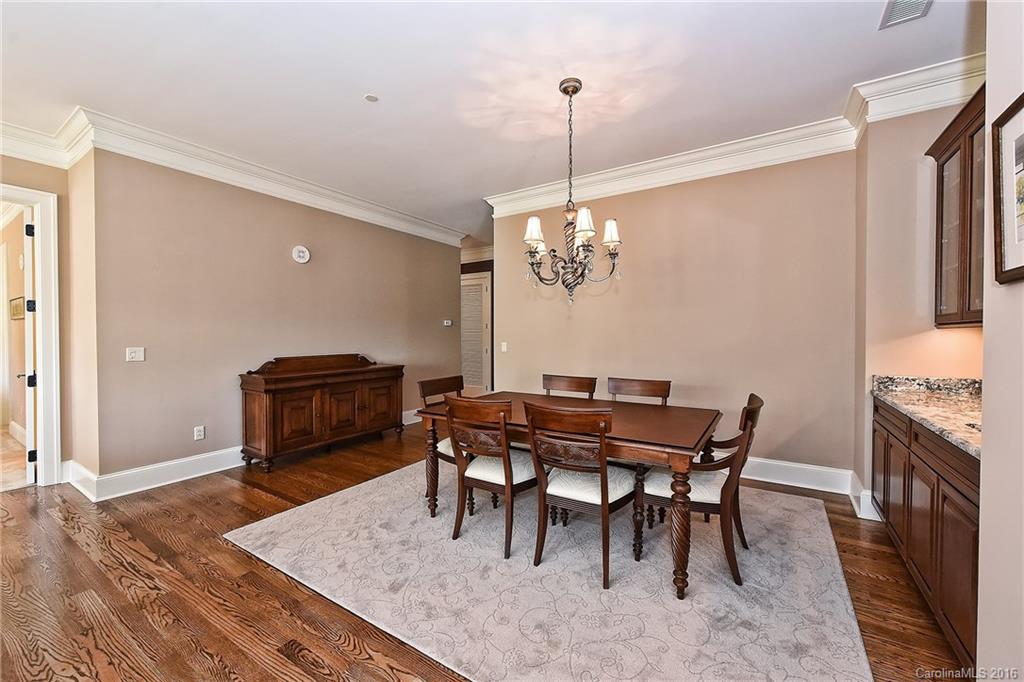 2823 Providence Road, Unit 228 Charlotte, NC 28211 - Photo 6 of 24 a view of a dining room with furniture
