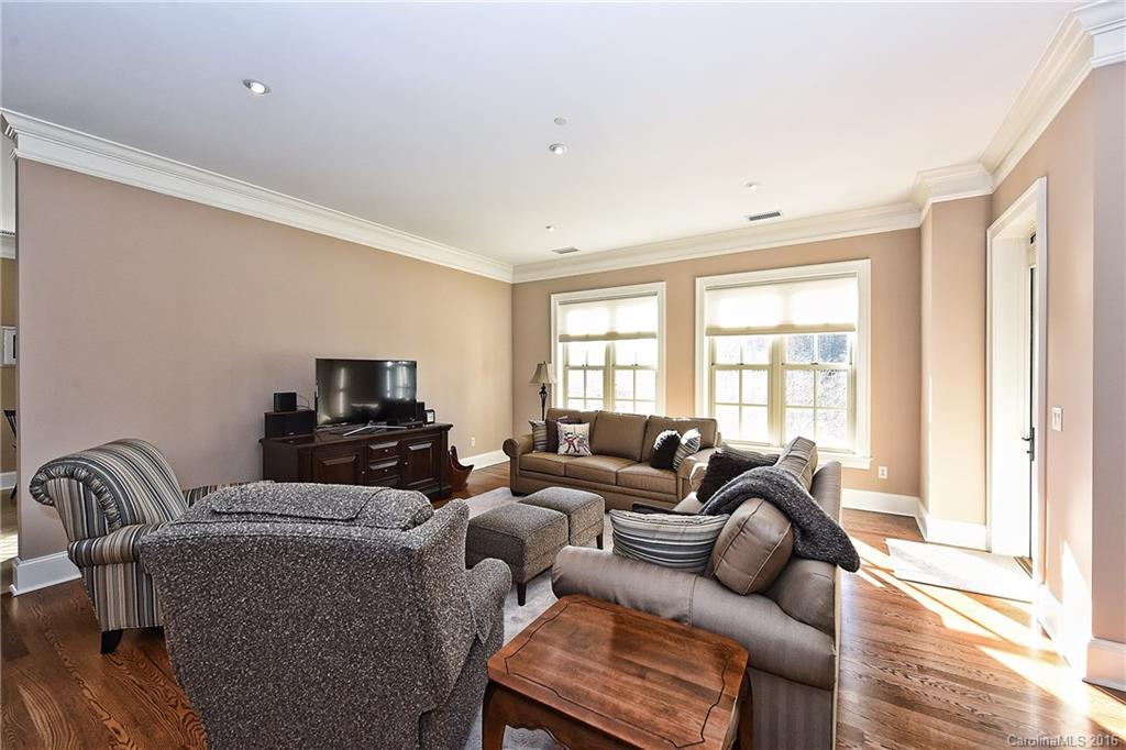 2823 Providence Road, Unit 228 Charlotte, NC 28211 - Photo 7 of 24 a living room with furniture a couch and a window
