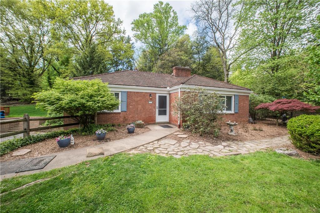 349 Thompson Run Road Pittsburgh, PA 15237 - Photo 1 of 22 a view of a house with backyard and sitting area