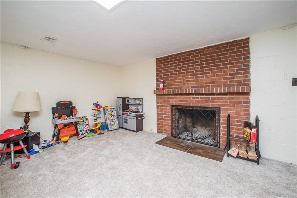 349 Thompson Run Road Pittsburgh, PA 15237 - Photo 15 of 22 a view of a livingroom with a fireplace