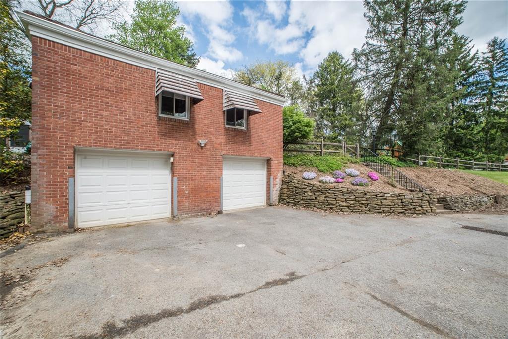 349 Thompson Run Road Pittsburgh, PA 15237 - Photo 20 of 22 a front view of house with garage