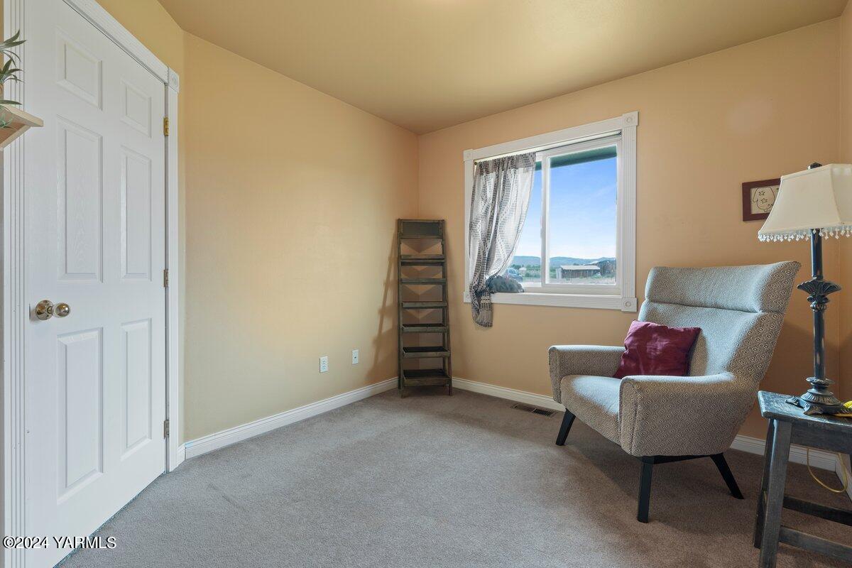 1084 Thompson Road Cowiche, WA 98923 - Photo 11 of 21 a living room with furniture and a window