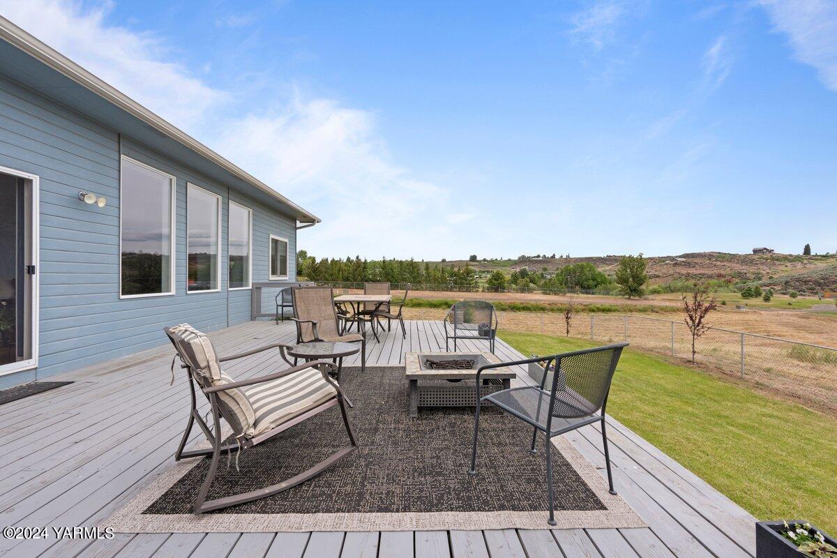1084 Thompson Road Cowiche, WA 98923 - Photo 19 of 21 a view of a lake with furniture