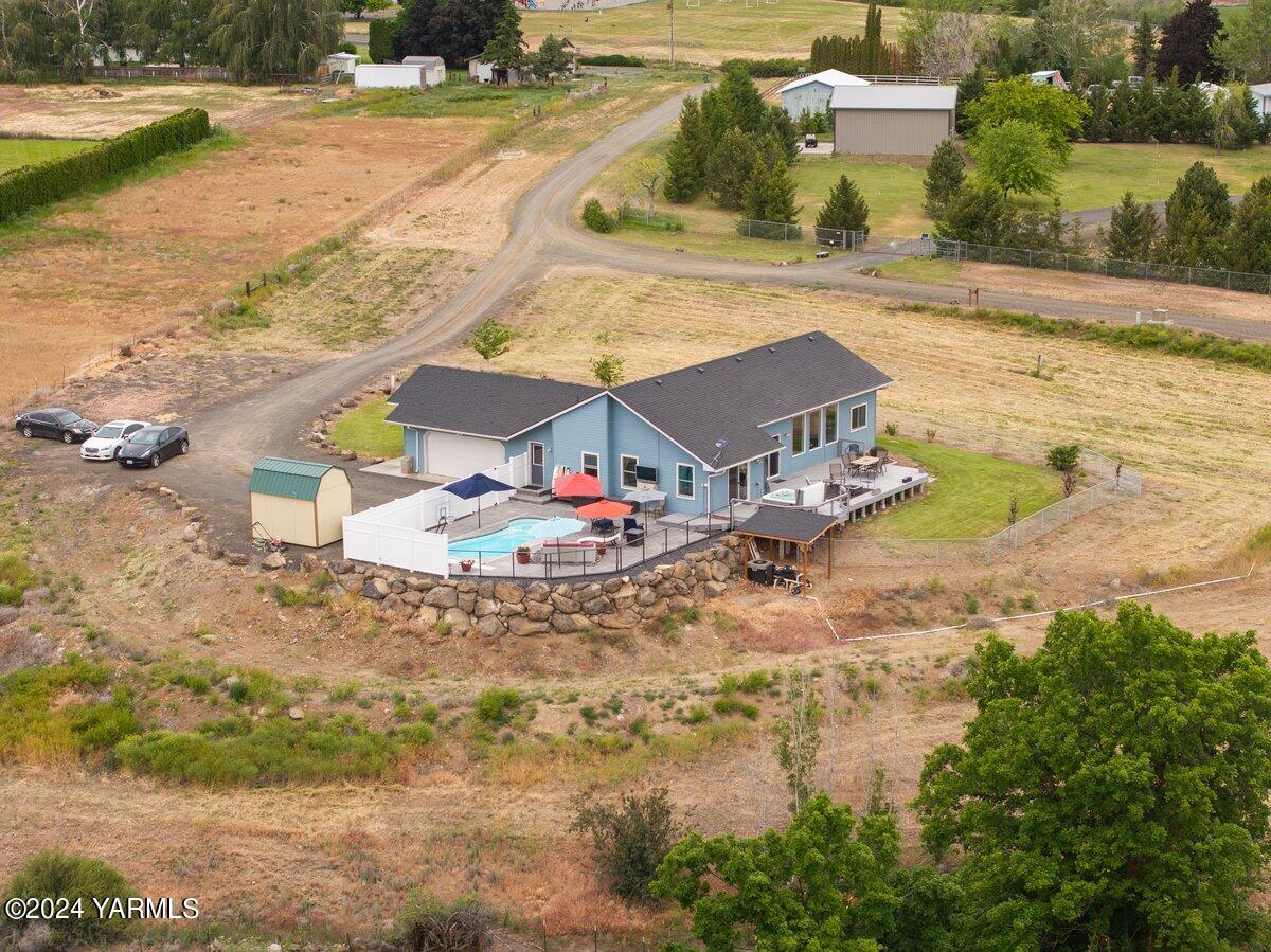 1084 Thompson Road Cowiche, WA 98923 - Photo 21 of 21 a view of a houses with beach