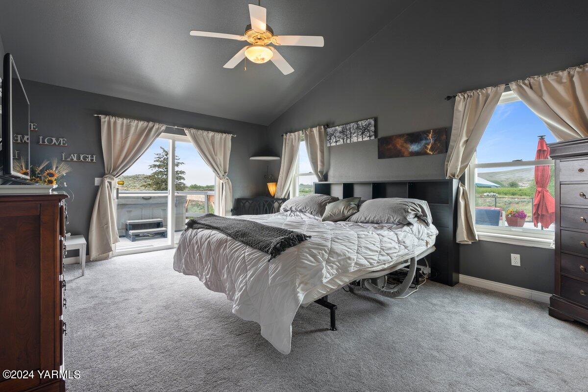 1084 Thompson Road Cowiche, WA 98923 - Photo 6 of 21 a bedroom with a bed dresser and a window