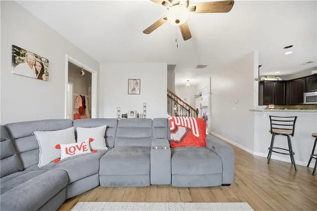 a bathroom with a tub sink and a mirror