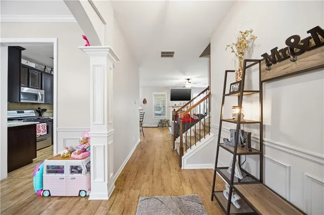 a kitchen with stainless steel appliances granite countertop a stove a sink dishwasher and refrigerator