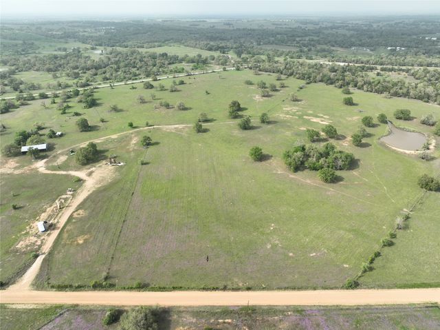 a view of a green field with lots of green space