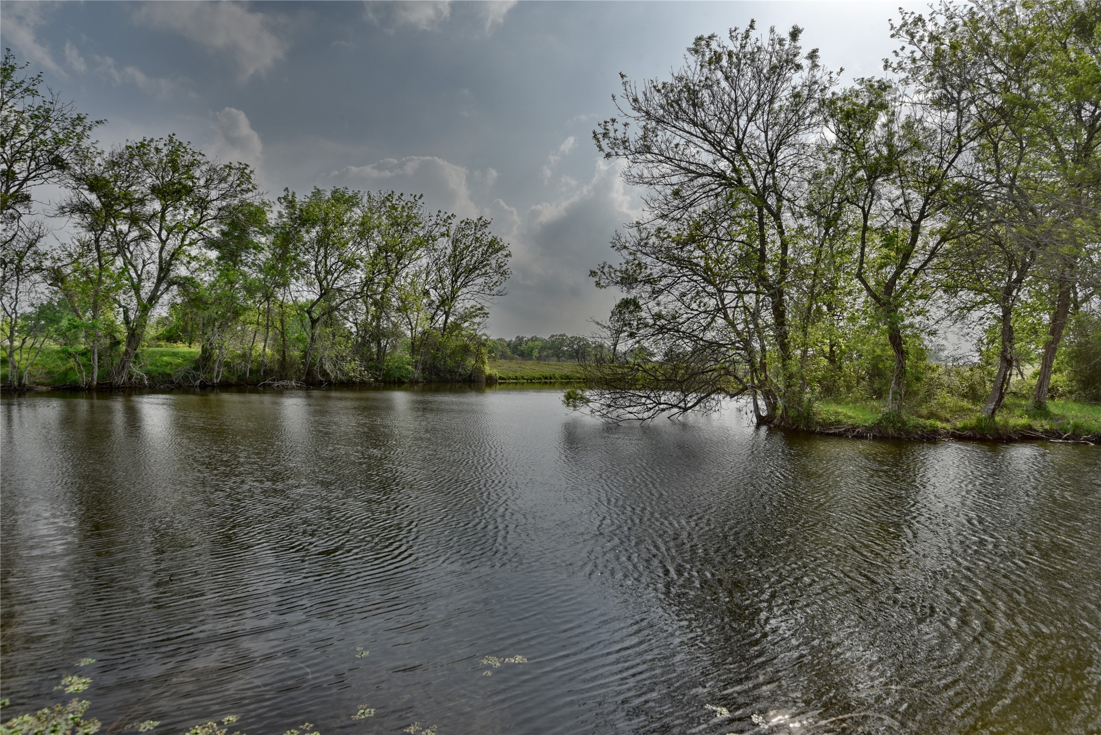 141 St Giddings Tx 78942 Giddings, TX 78942 - Photo 36 of 39 a view of a lake with a yard