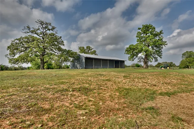 a view of house with garden space