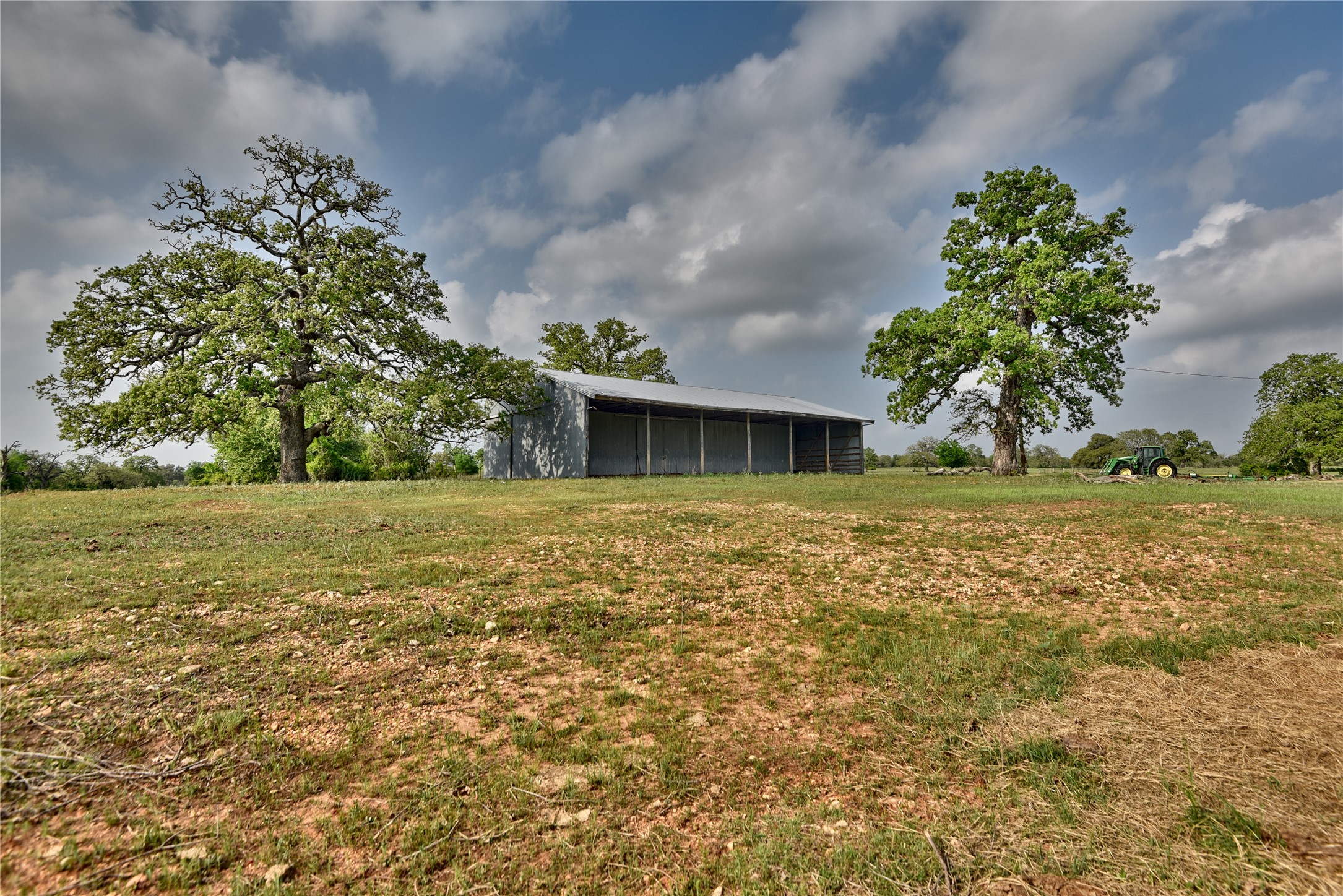 141 St Giddings Tx 78942 Giddings, TX 78942 - Photo 5 of 39 a view of house with garden space