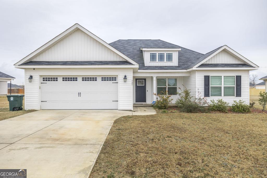 137 Sadie Heights Boulevard Perry, GA 31069 - Photo 1 of 25 a view of backyard of the house