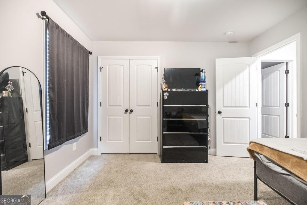 137 Sadie Heights Boulevard Perry, GA 31069 - Photo 21 of 25 a view of closet area