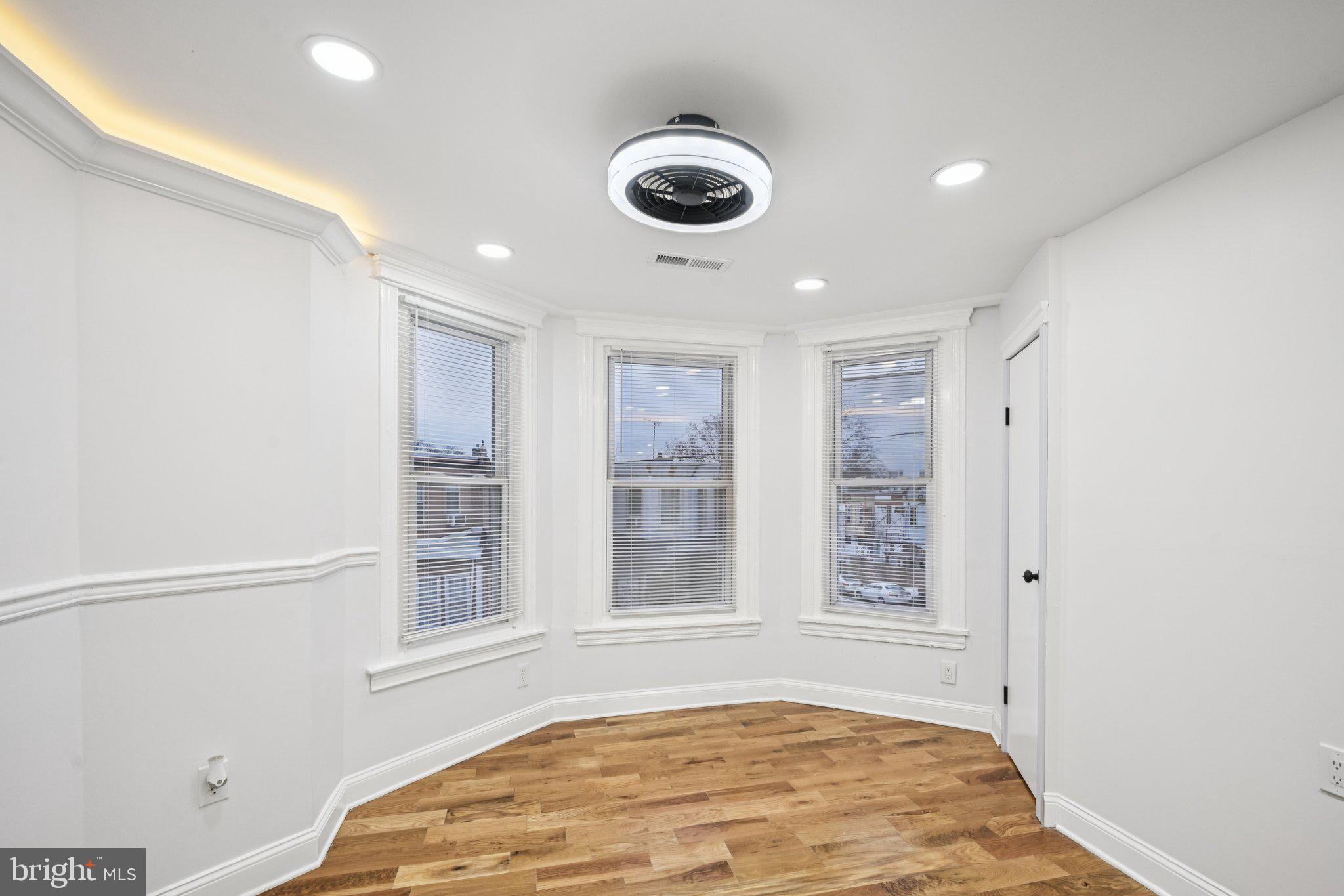 5702 Belmar Street Philadelphia, PA 19143 - Photo 12 of 29 a view of an empty room with a window