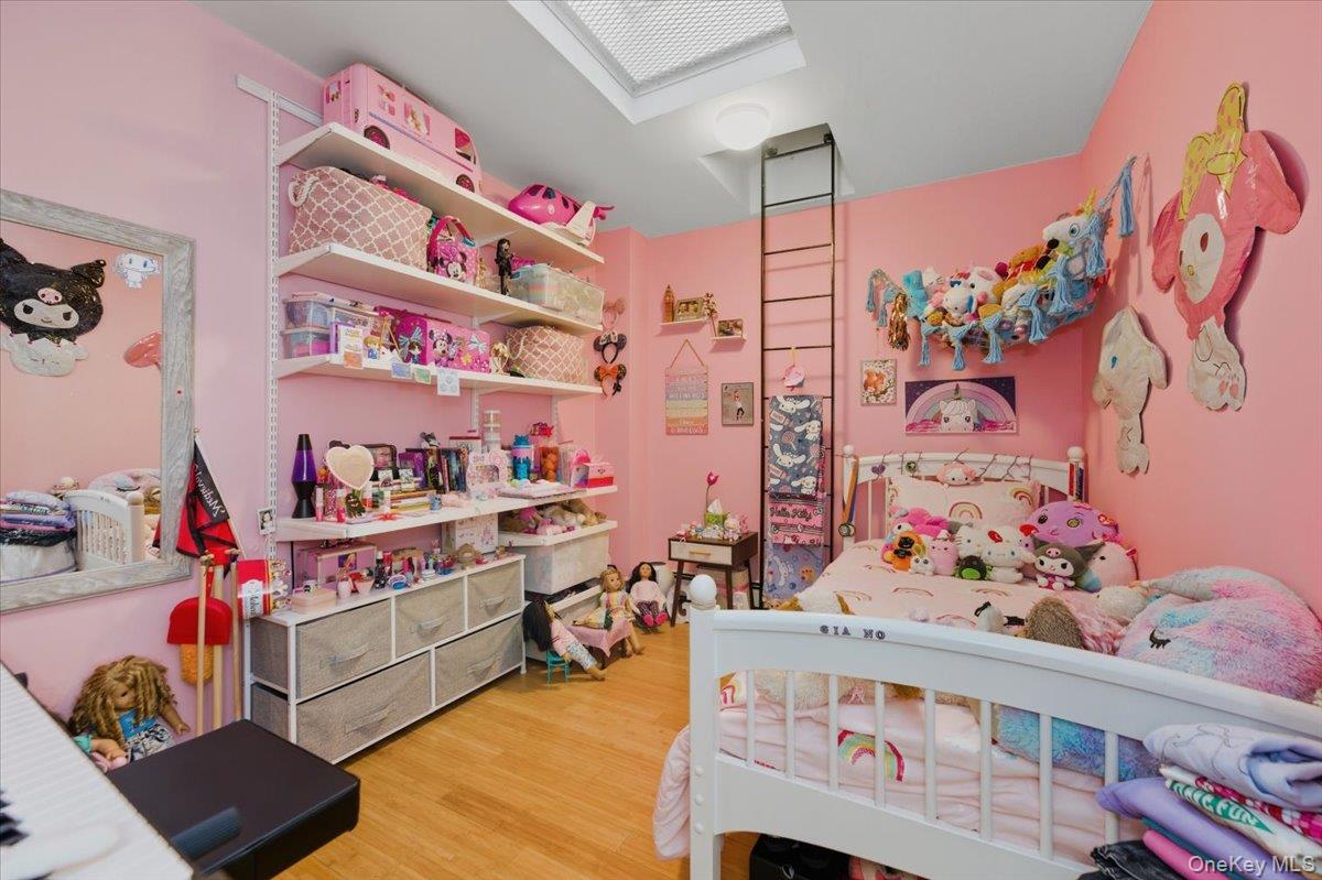 2853 Ely Avenue, Unit 3 Bronx, NY 10469 - Photo 10 of 20 a view of a room with baby toys