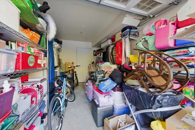 a bedroom with toys and a chandelier
