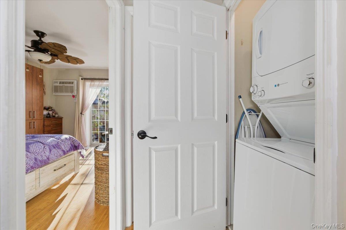 2853 Ely Avenue, Unit 3 Bronx, NY 10469 - Photo 14 of 20 a view of hallway with washer and dryer