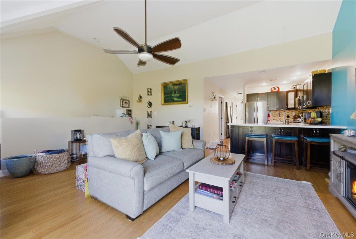 2853 Ely Avenue, Unit 3 Bronx, NY 10469 - Photo 2 of 20 a living room with furniture and a wooden floor