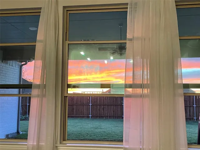 a view of a lake with sitting area