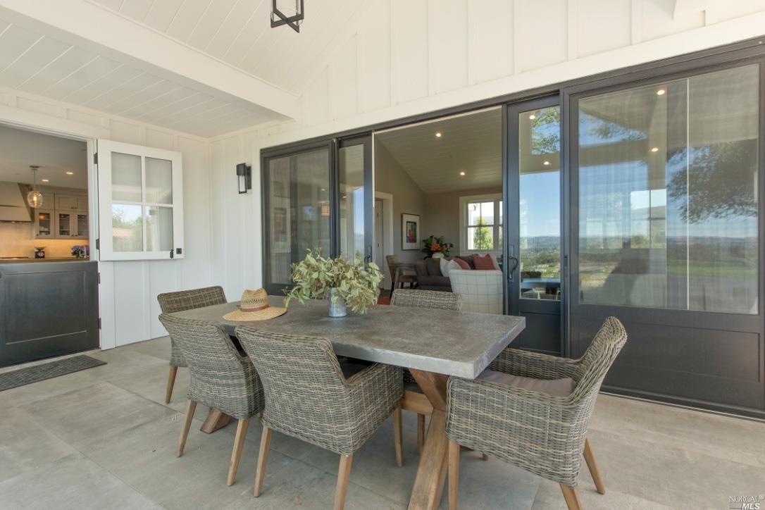 1531 Estee Avenue Napa, CA 94558 - Photo 14 of 49 a view of a dining room with furniture and a potted plant