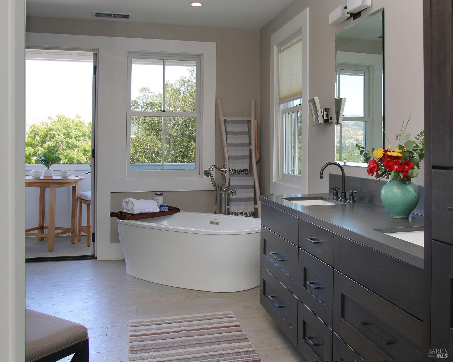 1531 Estee Avenue Napa, CA 94558 - Photo 21 of 49 a spacious bathroom with a double vanity sink mirror and a bathtub