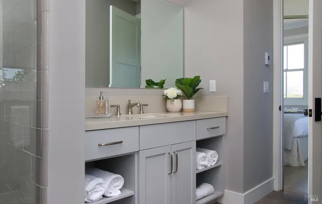 a bathroom with a toilet and a sink