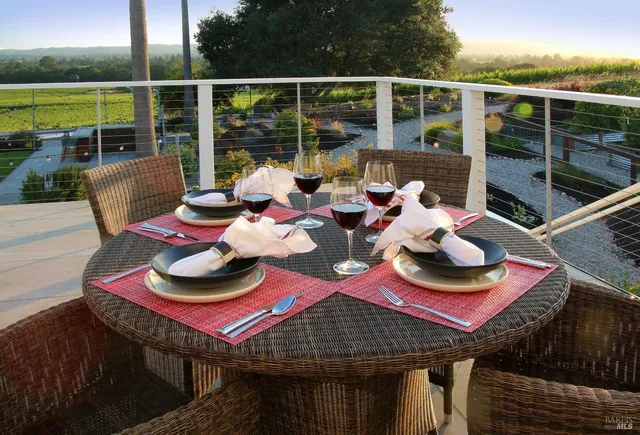 a view of an outside dining space with furniture window