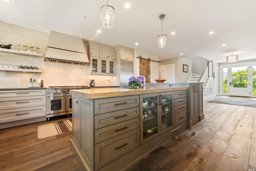1531 Estee Avenue Napa, CA 94558 - Photo 6 of 49 a kitchen with a sink stove and cabinets