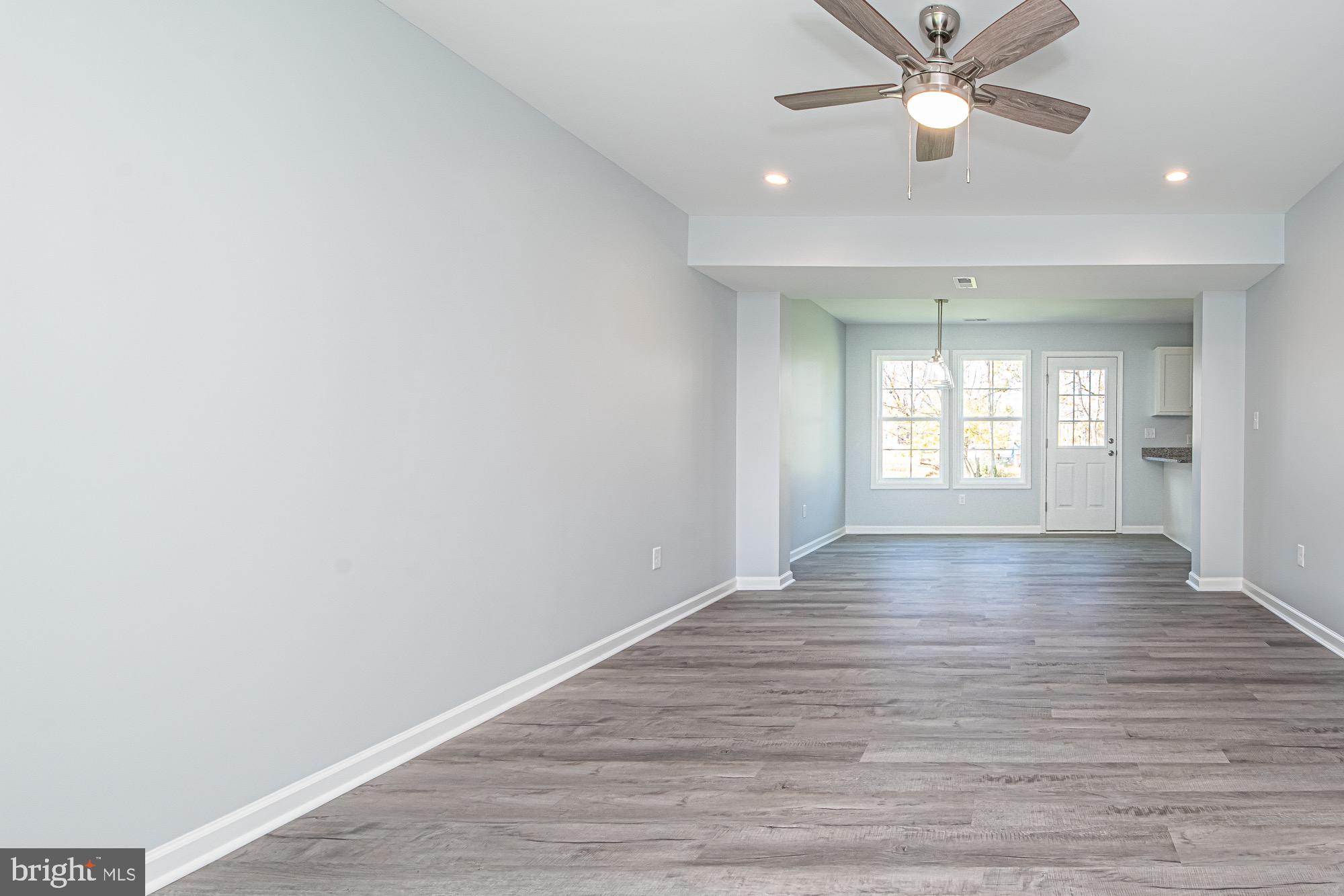 709 Ross Street Winchester, VA 22601 - Photo 14 of 40 wooden floor in an empty room with a window