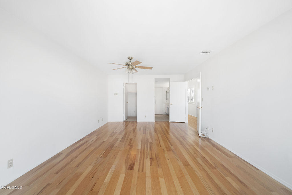 2260 Harbor Boulevard Oxnard, CA 93035 - Photo 21 of 28 a view of wooden floor in a hallway