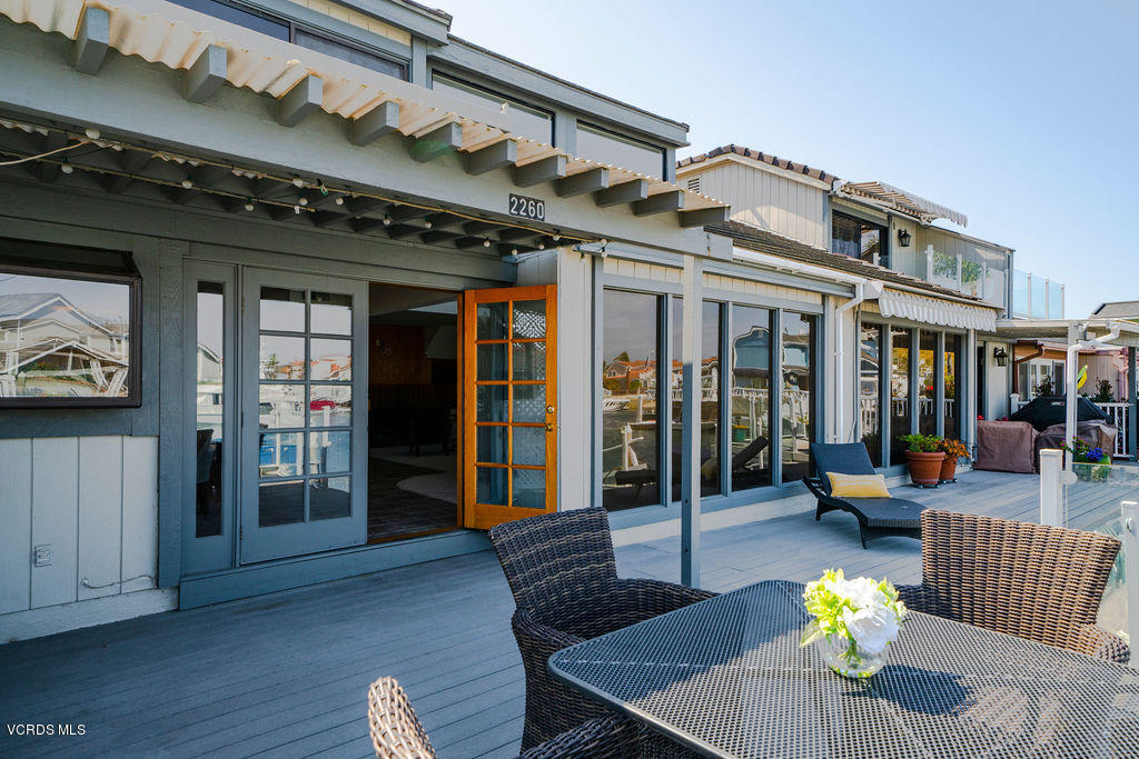 2260 Harbor Boulevard Oxnard, CA 93035 - Photo 28 of 28 a view of a patio with dining table and chairs