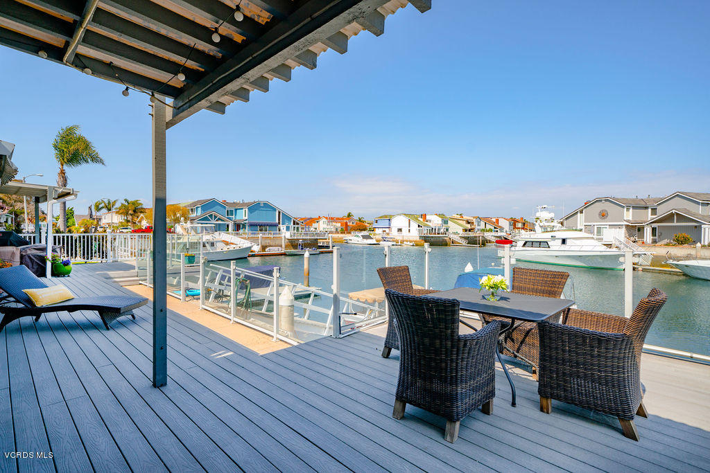 2260 Harbor Boulevard Oxnard, CA 93035 - Photo 4 of 28 a deck with furniture and wooden floor
