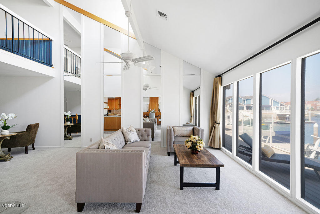 2260 Harbor Boulevard Oxnard, CA 93035 - Photo 8 of 28 a living room with furniture and large windows