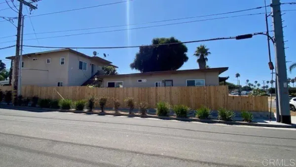 front view of a house with a street
