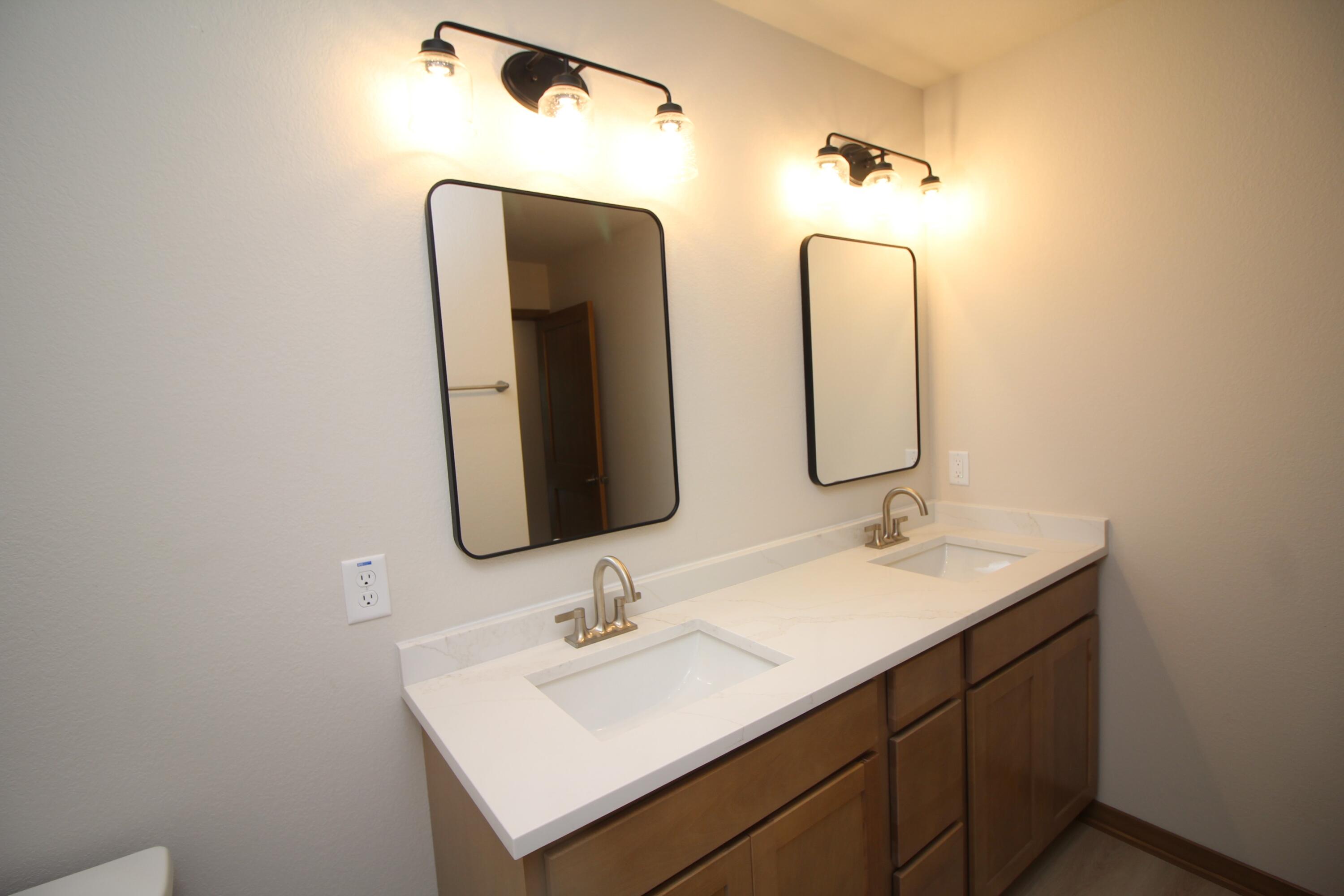 5357 Independence Road Mount Pleasant, WI 53406 - Photo 14 of 20 Primary bath with double sinks and walk in shower