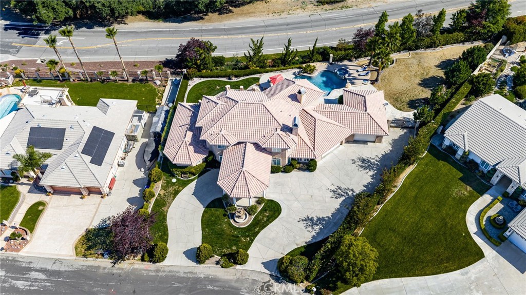 38136 Butterfly Court Yucaipa, CA 92399 - Photo 62 of 71 an aerial view of a house with a swimming pool