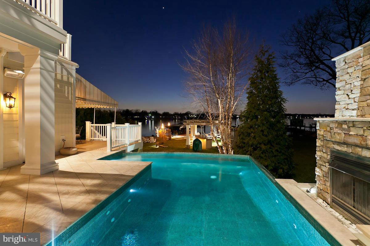 1712 Wilson Point Road Baltimore, MD 21220 - Photo 26 of 30 a view of a backyard with sitting area