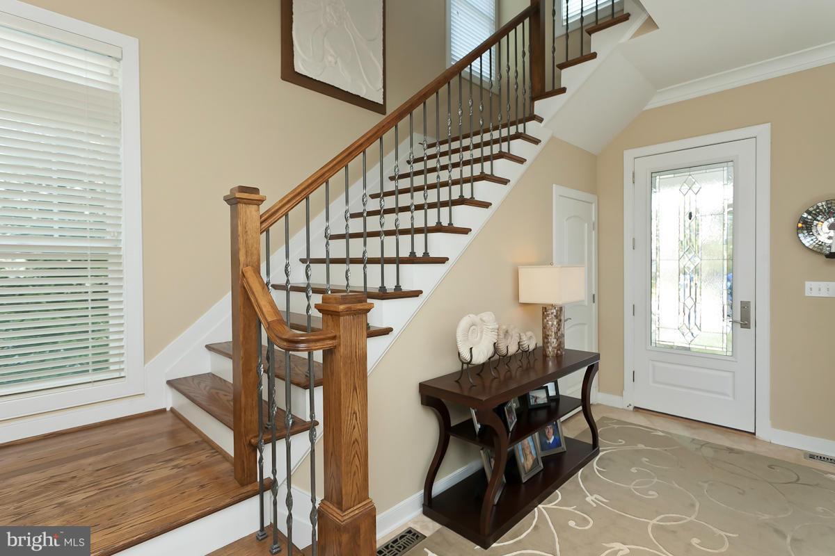 1712 Wilson Point Road Baltimore, MD 21220 - Photo 4 of 30 a view of entryway livingroom and hall with wooden floor