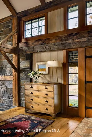 a white bath tub sitting in front of a bathroom