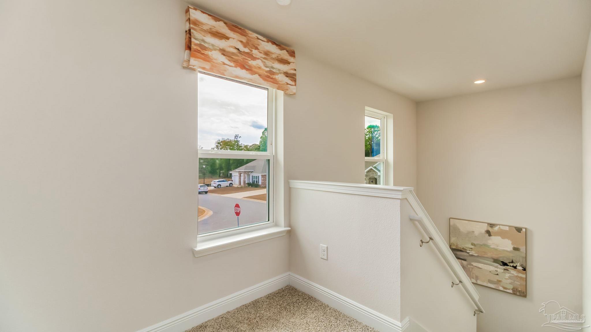 8717 Bluebell Street Milton, FL 32583 - Photo 20 of 30 a view of hallway with window