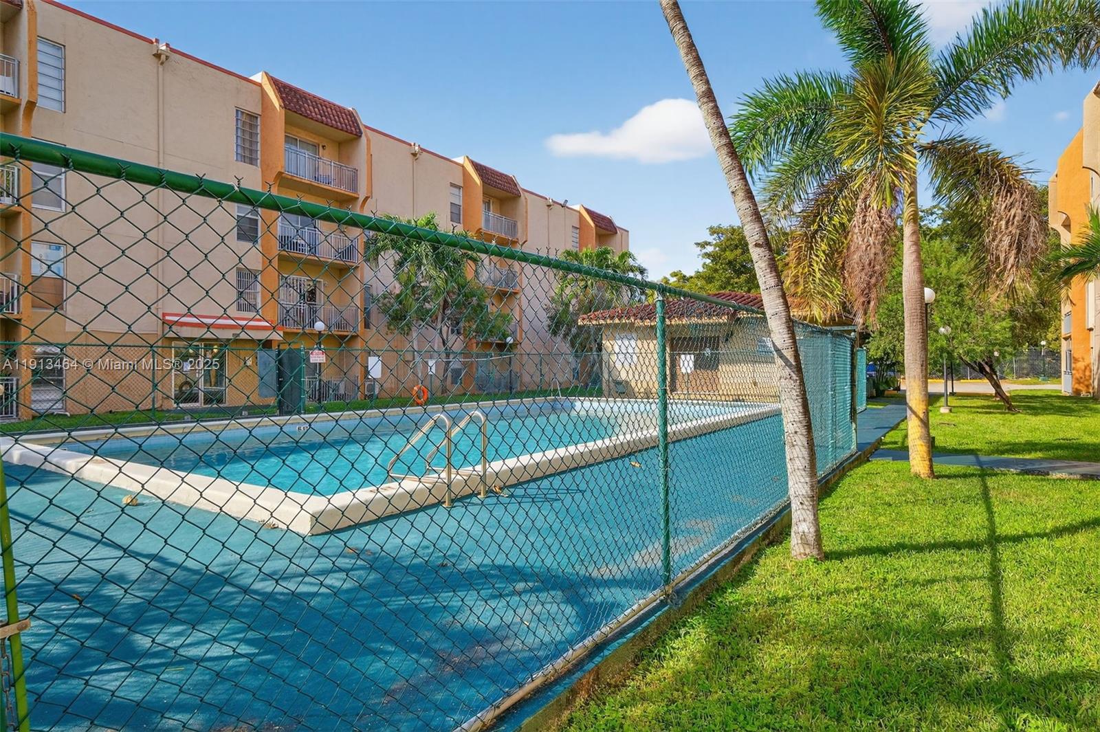 4841 Northwest 7th Street, Unit 3094 Miami, FL 33126 - Photo 13 of 33 a view of a house with a yard