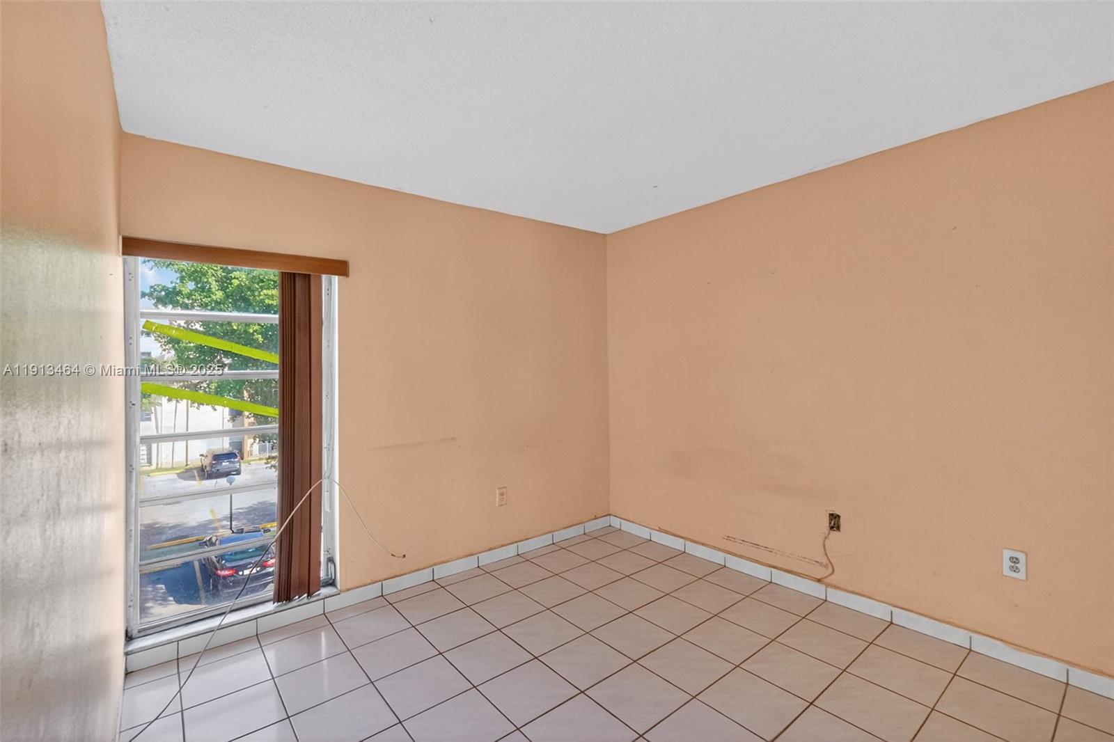 4841 Northwest 7th Street, Unit 3094 Miami, FL 33126 - Photo 21 of 33 a view of an empty room and window