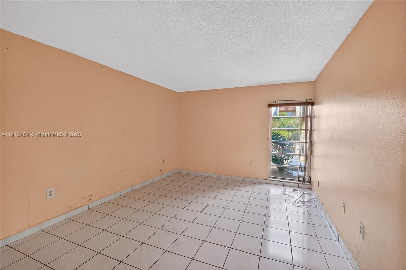4841 Northwest 7th Street, Unit 3094 Miami, FL 33126 - Photo 26 of 33 a view of an empty room and window