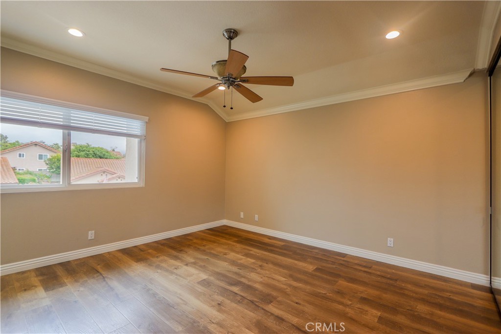7 Mejorana Rancho Santa Margarita, CA 92688 - Photo 26 of 44 an empty room with a window and a ceiling fan