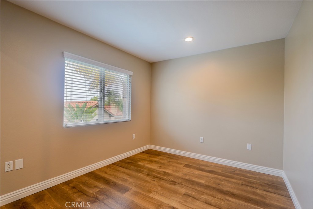 7 Mejorana Rancho Santa Margarita, CA 92688 - Photo 30 of 44 a view of an empty room with wooden floor and a window