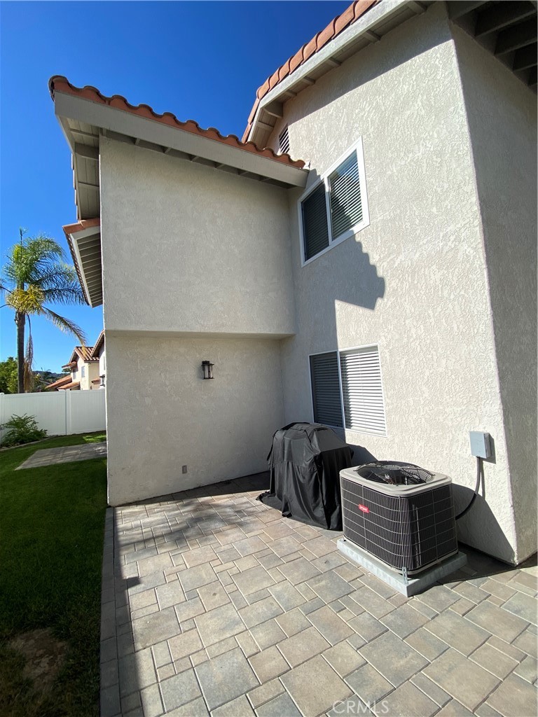 7 Mejorana Rancho Santa Margarita, CA 92688 - Photo 40 of 44 a room with a wooden floor and a potted plant