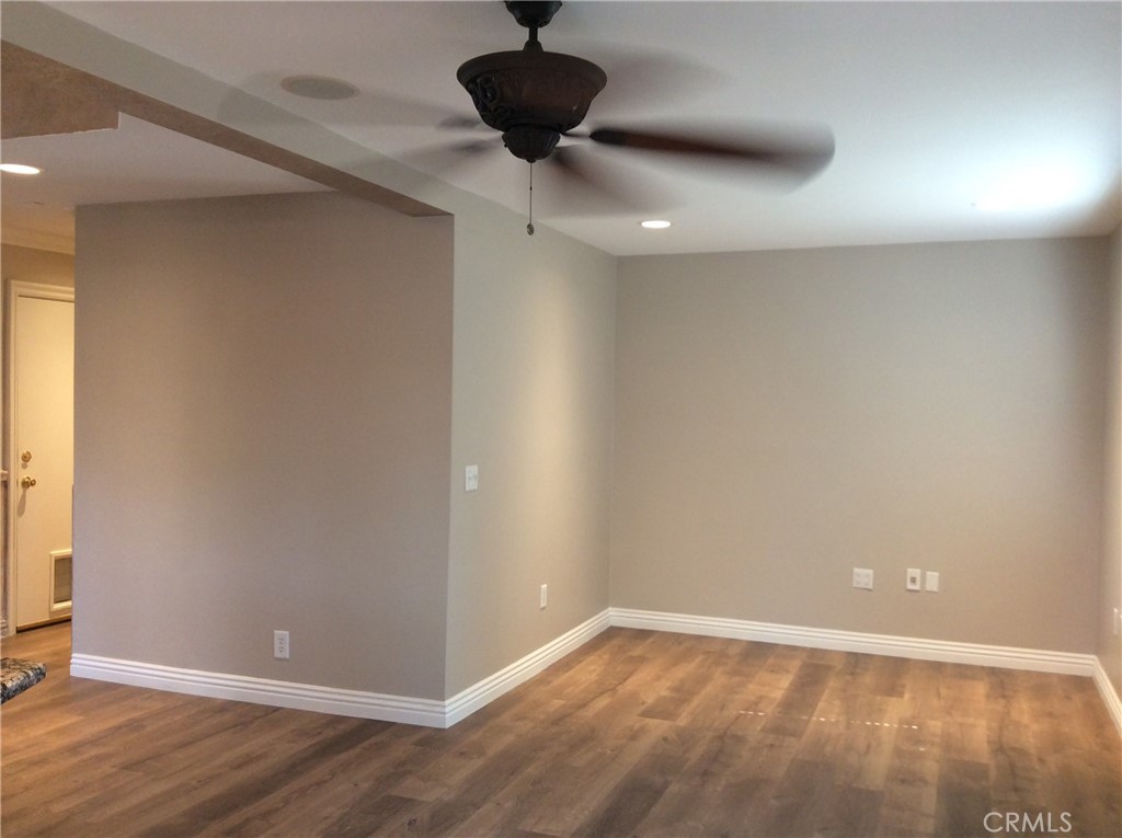 7 Mejorana Rancho Santa Margarita, CA 92688 - Photo 9 of 44 a view of an empty room with a ceiling fan and window